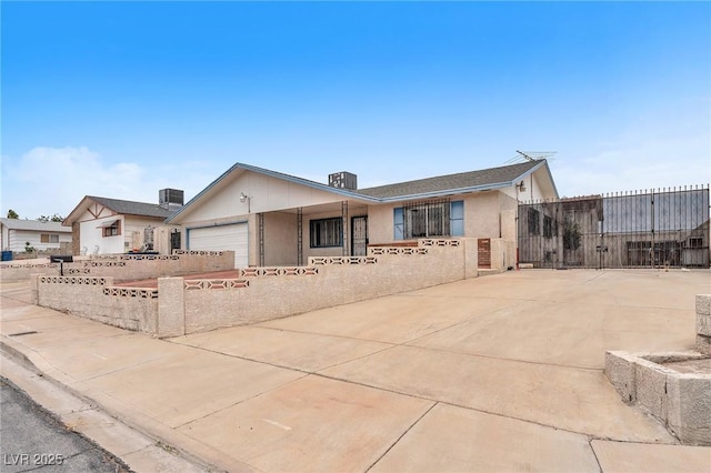4386 El Cebra Way, Las Vegas, NV 89121 - view of front of property featuring driveway and a garage