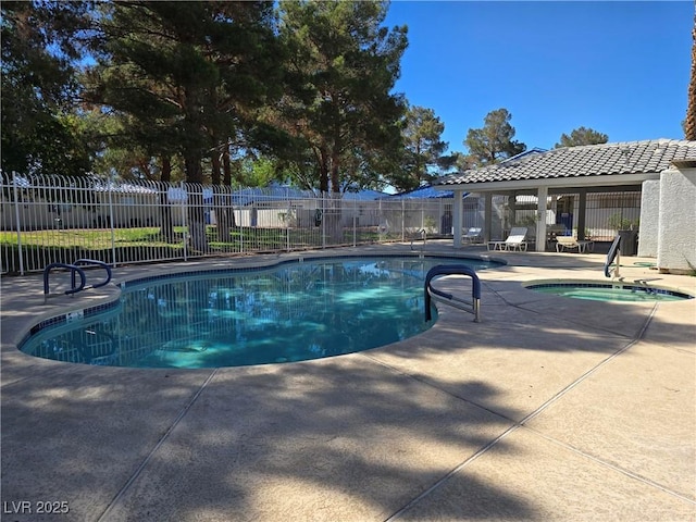 2116 Bavington Dr Unit C, Las Vegas, NV 89108 - community pool with a community hot tub and a patio