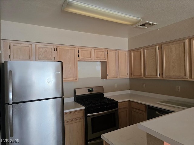 2116 Bavington Dr Unit C, Las Vegas, NV 89108 - kitchen featuring stainless steel appliances, light countertops, and light brown cabinets