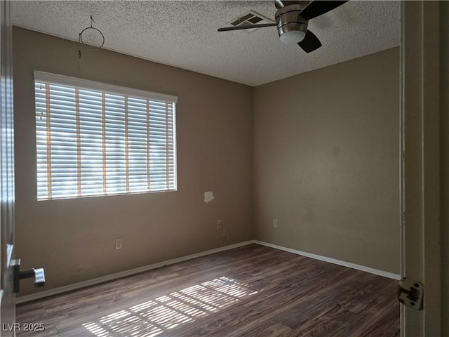 2116 Bavington Dr Unit C, Las Vegas, NV 89108 - unfurnished room with ceiling fan, plenty of natural light, wood finished floors, a textured ceiling, and baseboards
