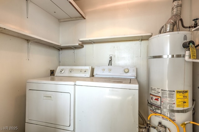 3683 Villa Knolls E Dr, Las Vegas, NV 89120 - laundry area with strapped water heater and washer and clothes dryer