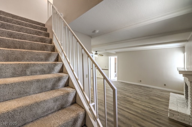 3683 Villa Knolls E Dr, Las Vegas, NV 89120 - stairway featuring wood finished floors, ceiling fan, baseboards, and beamed ceiling