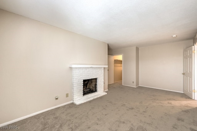 3683 Villa Knolls E Dr, Las Vegas, NV 89120 - unfurnished living room featuring carpet floors, a fireplace, and baseboards