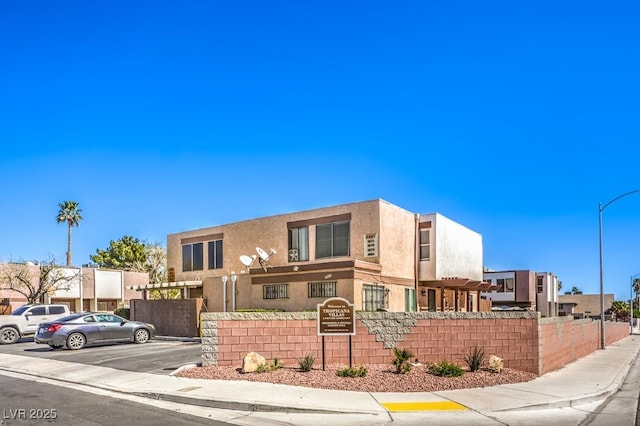 3683 Villa Knolls E Dr, Las Vegas, NV 89120 - multi unit property featuring uncovered parking and stucco siding