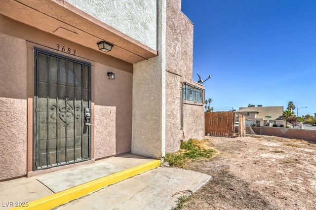 3683 Villa Knolls E Dr, Las Vegas, NV 89120 - property entrance with stucco siding