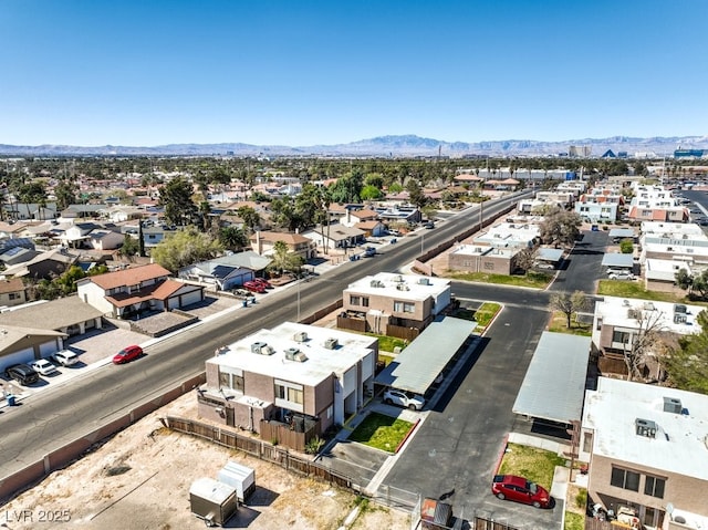 3683 Villa Knolls E Dr, Las Vegas, NV 89120 - aerial perspective of suburban area with a mountain backdrop