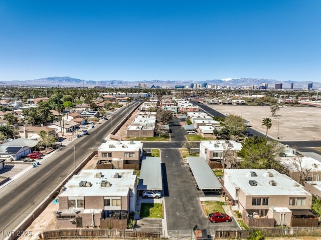3683 Villa Knolls E Dr, Las Vegas, NV 89120 - aerial perspective of suburban area with a mountain backdrop