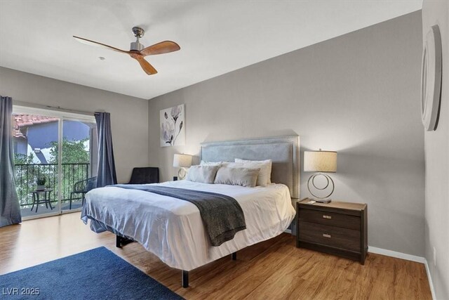 50 Aura De Blanco St Unit 18204, Henderson, NV 89074 - bedroom with access to outside, wood finished floors, baseboards, and ceiling fan