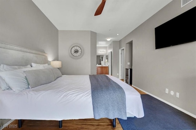 50 Aura De Blanco St Unit 18204, Henderson, NV 89074 - bedroom featuring baseboards, connected bathroom, and a ceiling fan