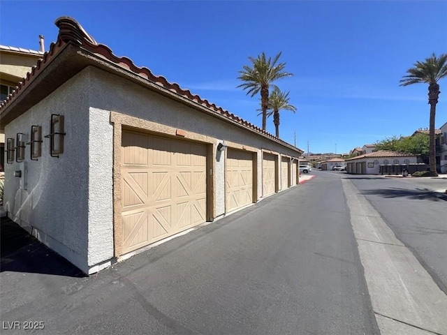 50 Aura De Blanco St Unit 18204, Henderson, NV 89074 - view of road with community garages