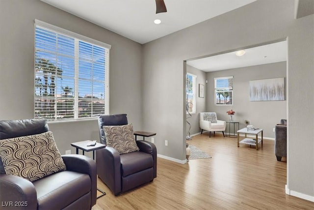 50 Aura De Blanco St Unit 18204, Henderson, NV 89074 - sitting room with light wood finished floors, baseboards, and a ceiling fan