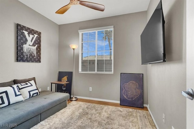 50 Aura De Blanco St Unit 18204, Henderson, NV 89074 - living area with wood finished floors, a ceiling fan, and baseboards