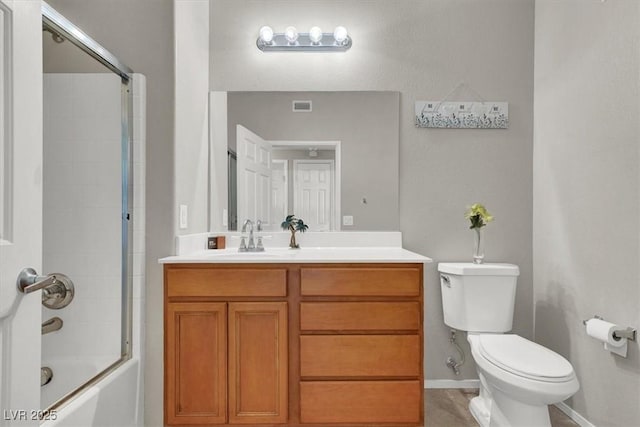 50 Aura De Blanco St Unit 18204, Henderson, NV 89074 - full bathroom featuring toilet, vanity, shower / bath combination with glass door, and baseboards