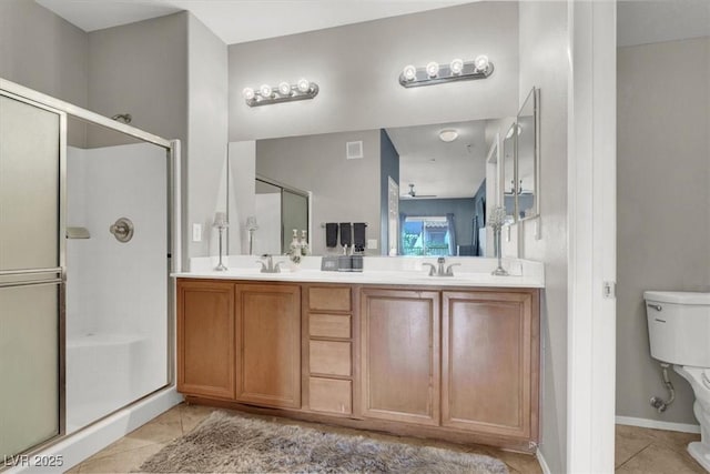 50 Aura De Blanco St Unit 18204, Henderson, NV 89074 - bathroom with a shower stall, tile patterned floors, toilet, and double vanity
