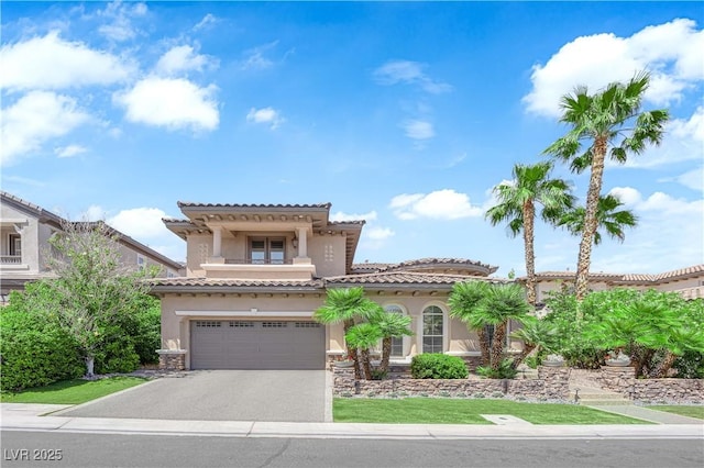 1972 Alcova Ridge Dr, Las Vegas, NV 89135 - mediterranean / spanish home featuring stucco siding, a garage, asphalt driveway, stone siding, and a tiled roof