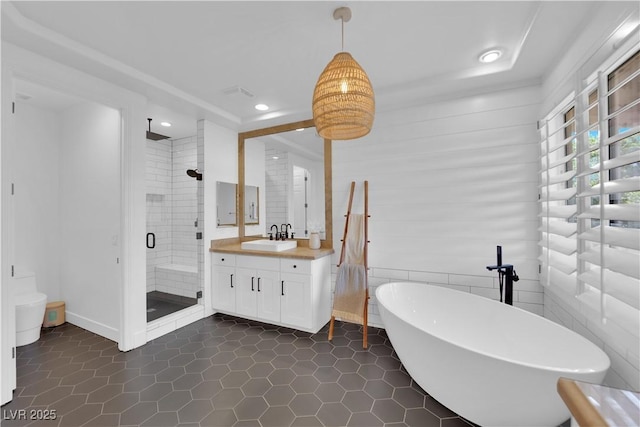 1972 Alcova Ridge Dr, Las Vegas, NV 89135 - full bathroom featuring vanity, a stall shower, a soaking tub, tile patterned floors, and recessed lighting