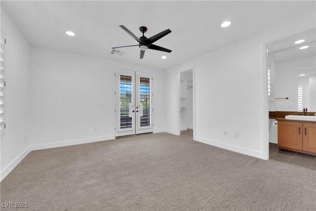 1972 Alcova Ridge Dr, Las Vegas, NV 89135 - unfurnished bedroom with access to outside, french doors, light colored carpet, and recessed lighting