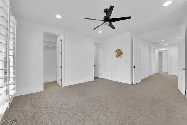 1972 Alcova Ridge Dr, Las Vegas, NV 89135 - unfurnished bedroom with carpet floors, recessed lighting, ceiling fan, baseboards, and a walk in closet