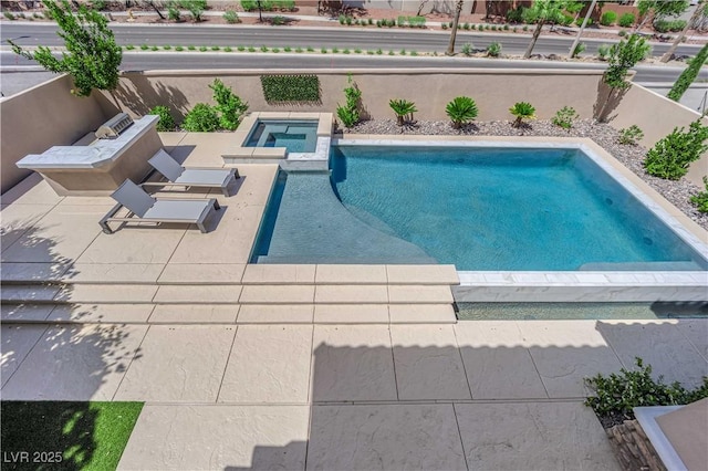 1972 Alcova Ridge Dr, Las Vegas, NV 89135 - view of pool featuring a pool with connected hot tub and a patio area