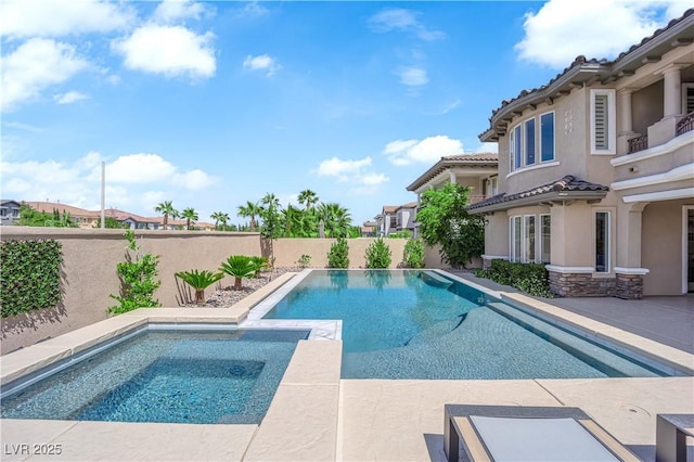 1972 Alcova Ridge Dr, Las Vegas, NV 89135 - view of swimming pool with a fenced backyard, a patio, and a pool with connected hot tub