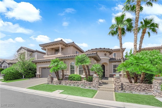 1972 Alcova Ridge Dr, Las Vegas, NV 89135 - mediterranean / spanish-style home with stucco siding, asphalt driveway, a garage, a front lawn, and a tile roof