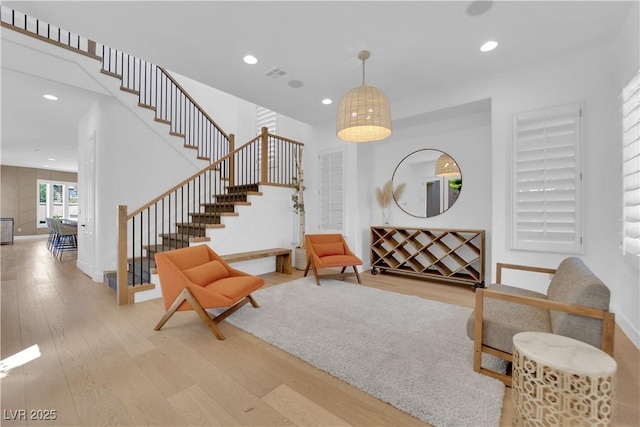 1972 Alcova Ridge Dr, Las Vegas, NV 89135 - living area featuring wood finished floors, stairway, recessed lighting, and baseboards