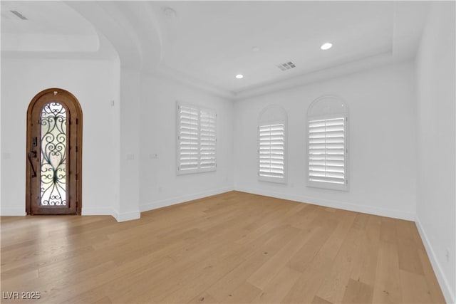 1972 Alcova Ridge Dr, Las Vegas, NV 89135 - entryway with arched walkways, light wood finished floors, baseboards, and recessed lighting