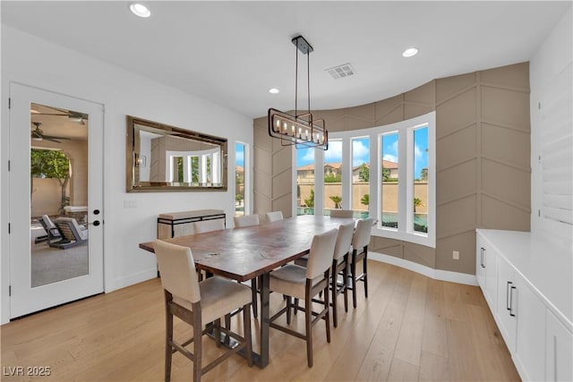 1972 Alcova Ridge Dr, Las Vegas, NV 89135 - dining area featuring light wood-type flooring, baseboards, recessed lighting, and a chandelier