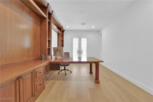 1972 Alcova Ridge Dr, Las Vegas, NV 89135 - home office with built in desk, light wood-style floors, baseboards, recessed lighting, and french doors