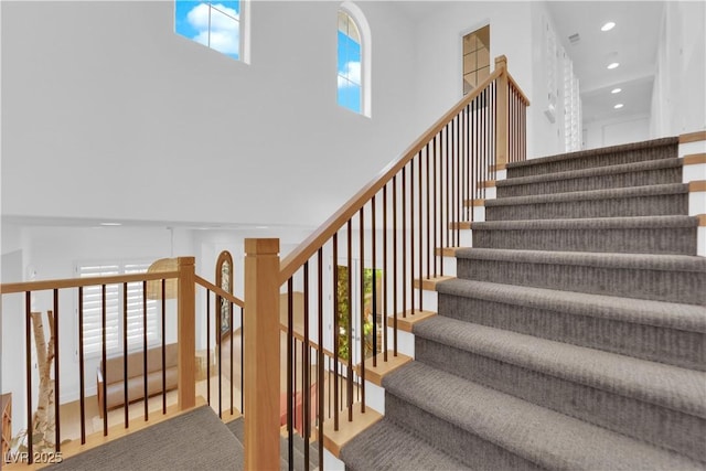 1972 Alcova Ridge Dr, Las Vegas, NV 89135 - stairway featuring a high ceiling and recessed lighting