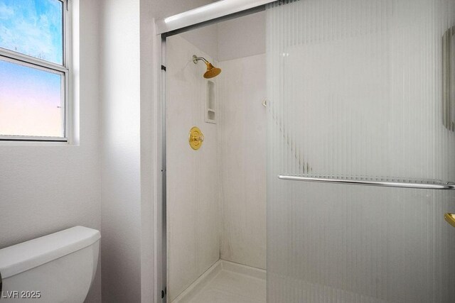 9524 Quail Ridge Dr, Las Vegas, NV 89134 - full bathroom with a stall shower and toilet