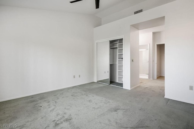 9524 Quail Ridge Dr, Las Vegas, NV 89134 - unfurnished bedroom featuring carpet, baseboards, a closet, high vaulted ceiling, and a ceiling fan