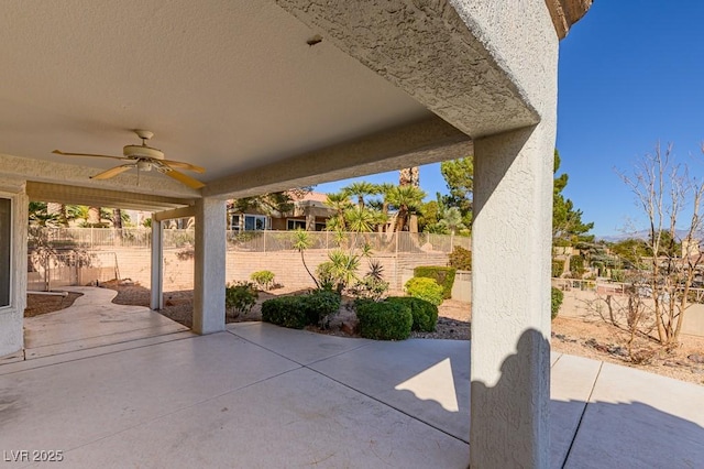 9524 Quail Ridge Dr, Las Vegas, NV 89134 - fenced backyard featuring a ceiling fan and a patio area