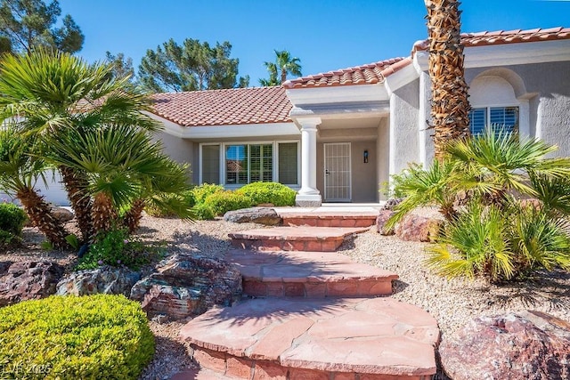 9524 Quail Ridge Dr, Las Vegas, NV 89134 - view of front of home with a tile roof and stucco siding