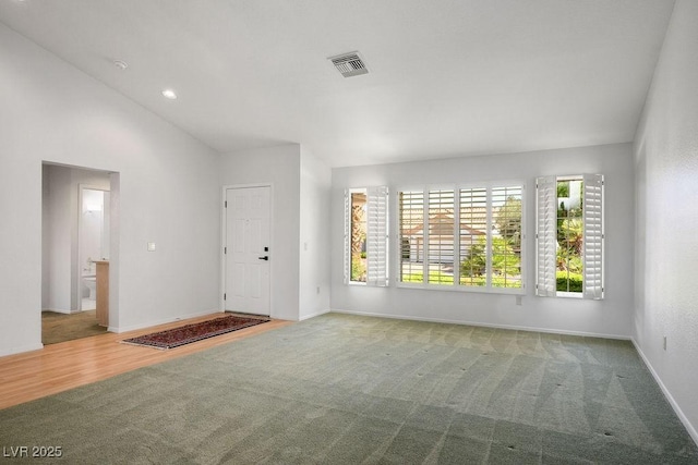 9524 Quail Ridge Dr, Las Vegas, NV 89134 - carpeted entryway featuring baseboards and lofted ceiling