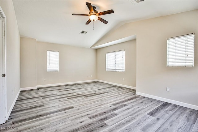 7083 Somera Way, Las Vegas, NV 89113 - unfurnished room with a ceiling fan, wood finished floors, vaulted ceiling, and baseboards