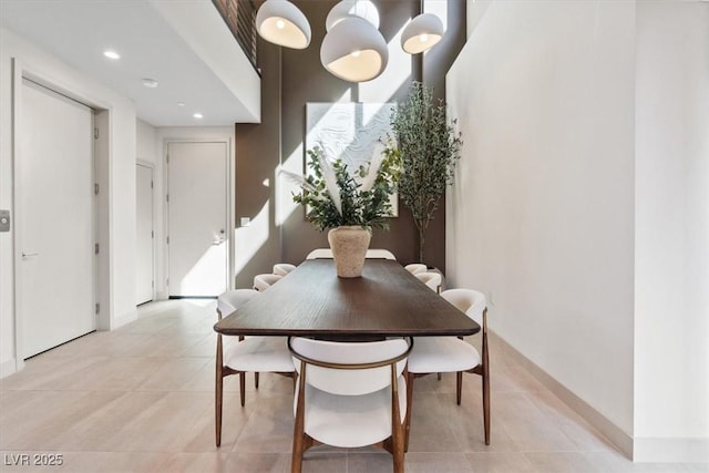 40 Heron Harbour Dr, Henderson, NV 89011 - dining area with light tile patterned floors, baseboards, and recessed lighting