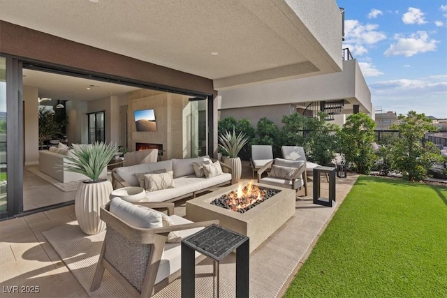40 Heron Harbour Dr, Henderson, NV 89011 - view of patio / terrace with an outdoor living space with a fire pit