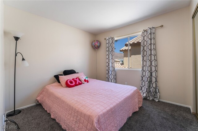 5779 Baffy Cir, Las Vegas, NV 89142 - carpeted bedroom featuring baseboards