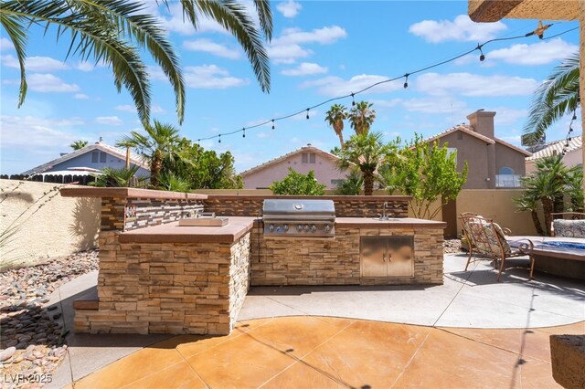 5779 Baffy Cir, Las Vegas, NV 89142 - view of patio featuring a sink