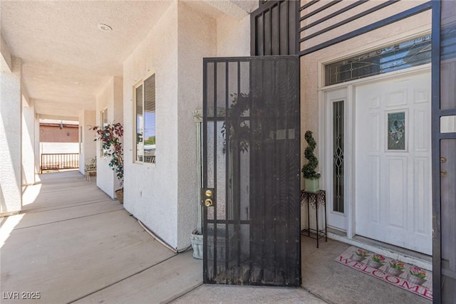 60 N Fogg St, Las Vegas, NV 89110 - doorway to property with stucco siding