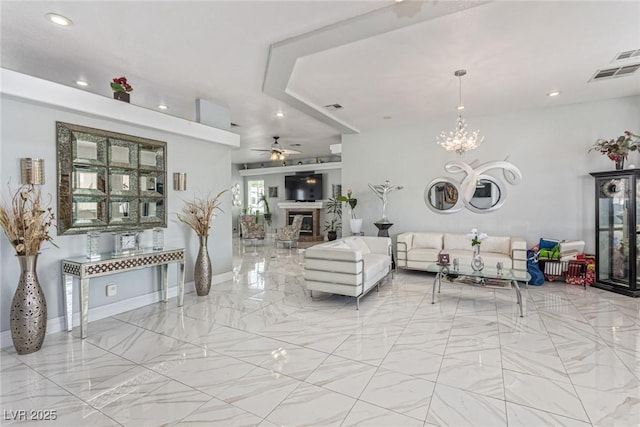 60 N Fogg St, Las Vegas, NV 89110 - living area with marble finish flooring, ceiling fan, recessed lighting, a chandelier, and a glass covered fireplace