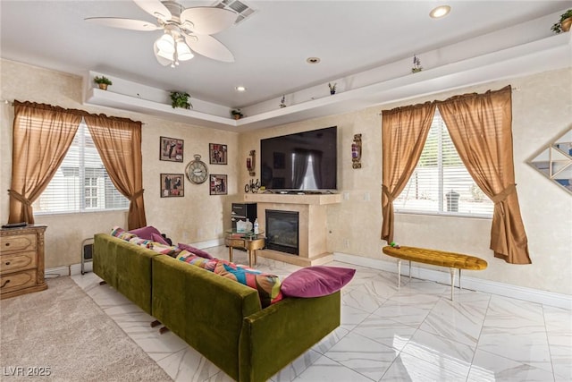 60 N Fogg St, Las Vegas, NV 89110 - living room with healthy amount of natural light, a fireplace, ceiling fan, recessed lighting, and baseboards