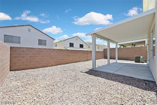 4132 Joyous St, North Las Vegas, NV 89032 - fenced backyard featuring central AC and a patio area