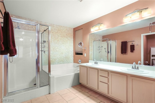 8928 Rusty Rifle Ave, Las Vegas, NV 89143 - full bathroom with a stall shower, a bath, tile patterned flooring, and double vanity