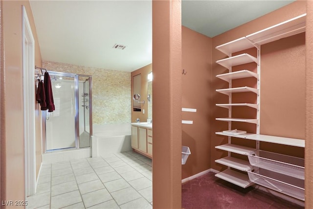8928 Rusty Rifle Ave, Las Vegas, NV 89143 - spacious closet with tile patterned flooring