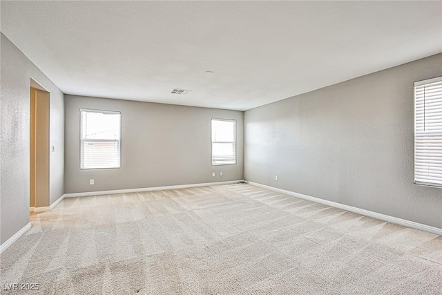 9271 Martel Ave, Las Vegas, NV 89148 - spare room with light colored carpet and baseboards
