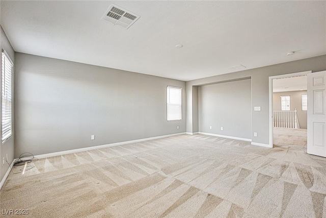 9271 Martel Ave, Las Vegas, NV 89148 - spare room with light carpet, healthy amount of natural light, and baseboards