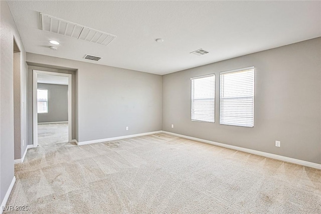 9271 Martel Ave, Las Vegas, NV 89148 - spare room featuring light carpet and baseboards