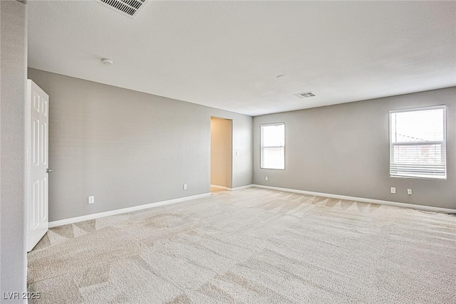 9271 Martel Ave, Las Vegas, NV 89148 - empty room featuring baseboards, light carpet, and a smoke detector